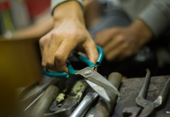 The master presented the President with shoes