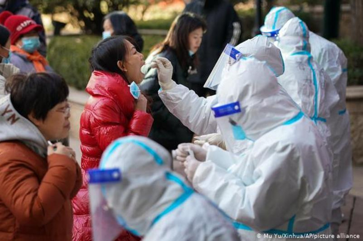 China shortens COVID quarantine time for international travellers