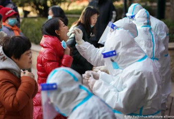 China shortens COVID quarantine time for international travellers