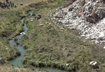 Стихийная свалка частично перекрыла русло реки в Алматинской области