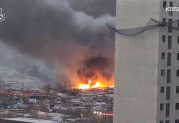 Трущобный поселок рядом с элитным районом Gangnam загорелся в Сеуле