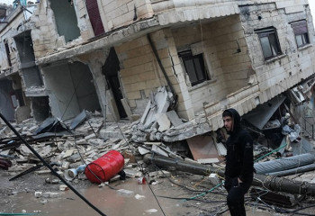 How does aid get into rebel-held northwest Syria?