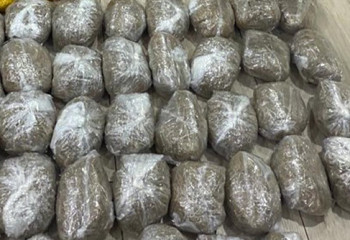 ҰҚК қызметкерлері 100 келіден аса героин тәркіледі