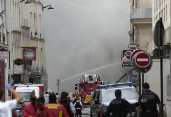 Several people injured after blast rips through building in central Paris