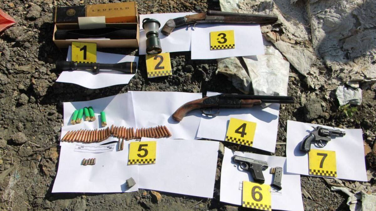 На свалке в Текели нашли схрон с оружием и боеприпасами