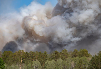 Canada mourns deaths of firefighters as wildfires ravage millions of acres