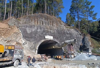 Rescuers race to save 40 workers trapped in India tunnel