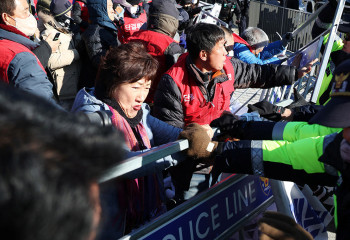 South Korean farmers scuffle with police at protest over dog meat ban