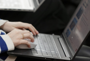 How many women head IT companies in Astana Hub