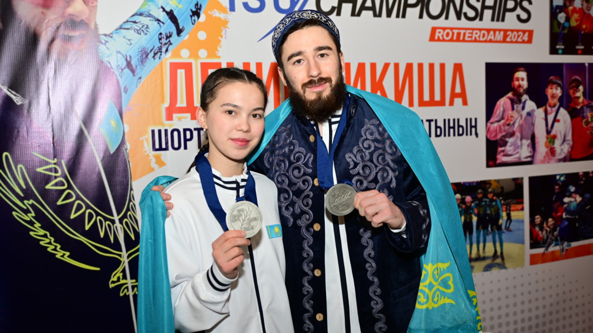 Дениса Никишу и Алину Ажгалиеву встретили в аэропорту Астаны