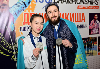 Дениса Никишу и Алину Ажгалиеву встретили в аэропорту Астаны