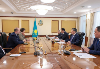 Olzhas Bektenov and Tobias Bartz, head of German company Rhenus Group, discuss cooperation in logistics and transport sector