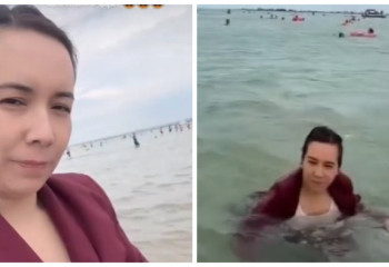 «Педагогпын». Жұмыс киімімен көлге шомылған әйел көпшіліктің назарын аудартты