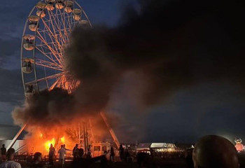 Германияда айналмалы дөңгелек өртеніп, 65 адам зардап шекті