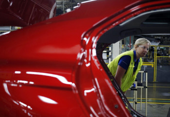 Toyota delays US electric car plans as sales slow