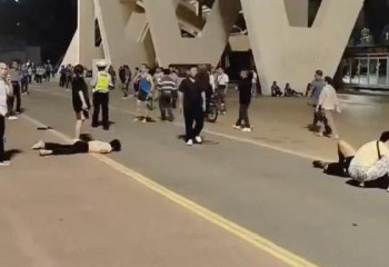 Several injured after car ploughs into crowd in China