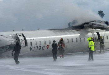 Delta plane flips upside down on landing at Toronto airport