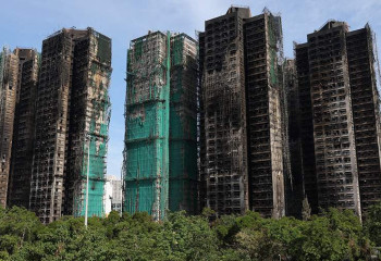 Гонконгта өрттен қаза тапқандардың отбасыларына 25,7 мың доллардан төленеді