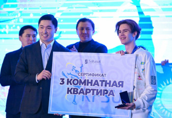 Алтынмен оралған чемпион: Михаил Шайдоровқа Астанадан үш бөлмелі пәтер берілді