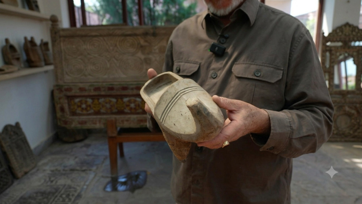 Art collector Azat Akimbek presents traditional Kazakh high-heeled wooden footwear